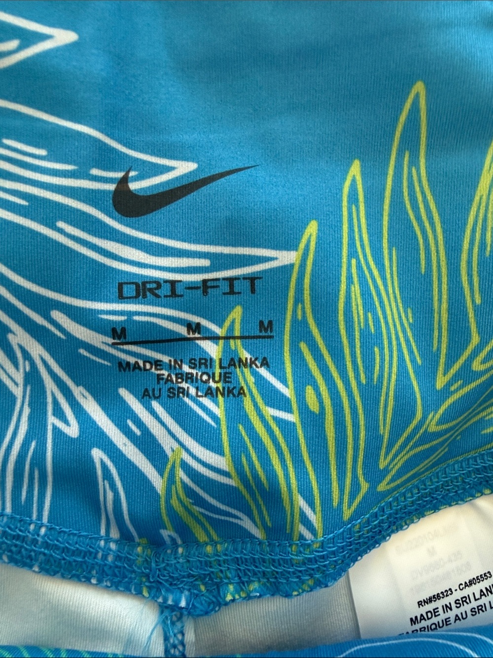 Nike Blue Tropical Leaf Women’s Leggings - Picture 2 of 3